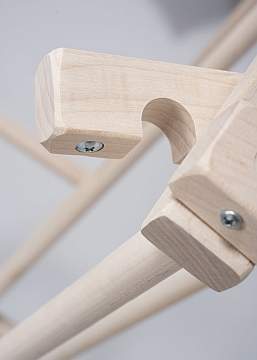 close-up of latch for accordion style clothes drying rack
